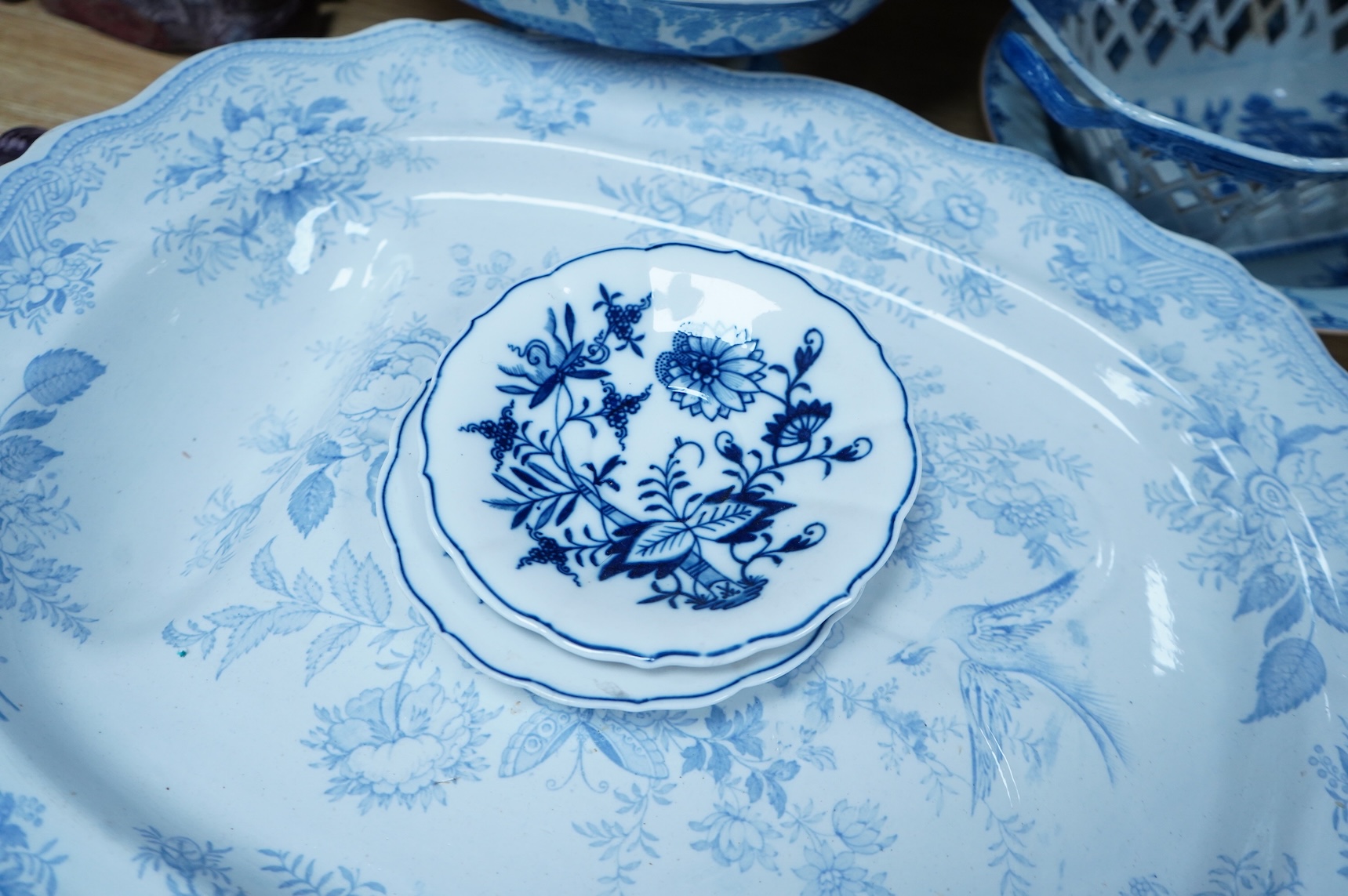 A group of Victorian blue-printed dinner wares, including a Chinese blue and white dish and a Wade bird (13).